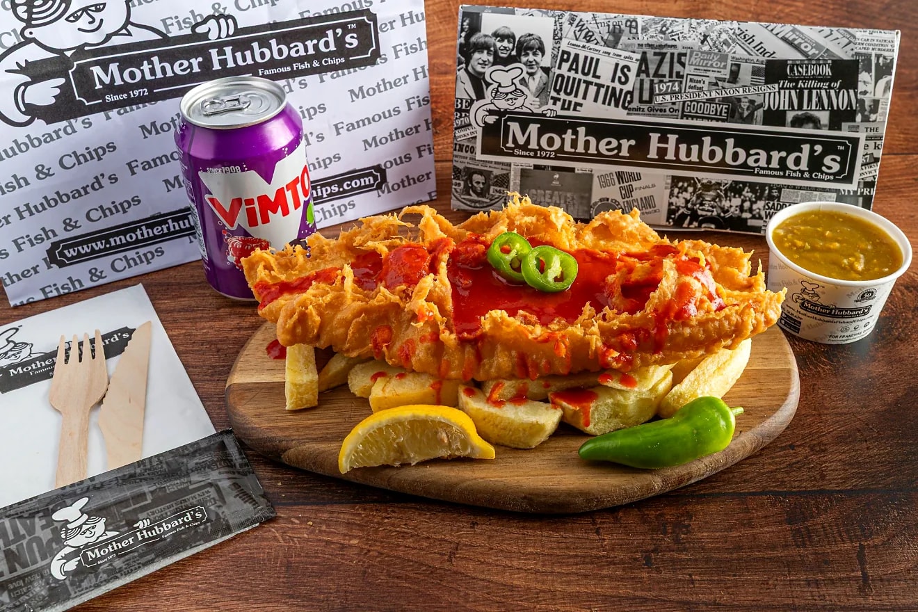 Dynamite-dipped fish and chips in a bright red coating
